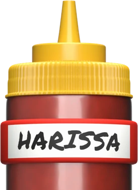 Squeeze bottle of harissa wearing a red Kitchen Bandits band