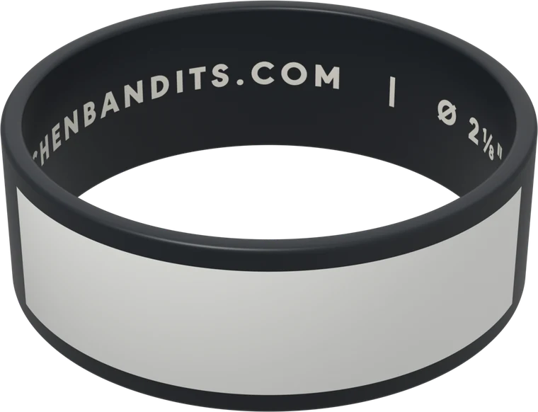 A black 2 1/8-inch Kitchen Bandits band, its white writing box hand-labelled TUESDAY in marker