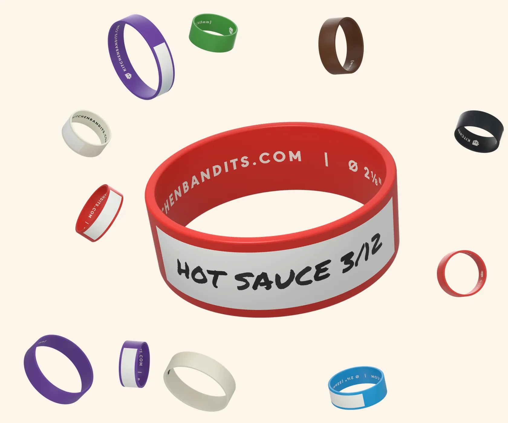A red Kitchen Bandits band hand-labeled HOT SAUCE 3/12, with bands in all eight colors and four sizes falling around it